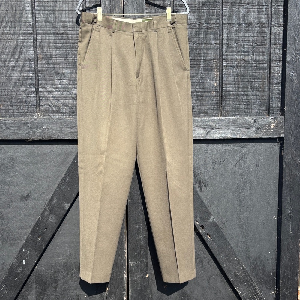 Pleated High waisted Relaxed Wool Trousers.